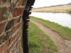 Metal protecting the edge of the bridge