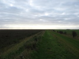 Heading along the flood bank