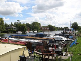 Canal boats besides the Thames