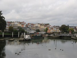 Canal boats besides the Thames