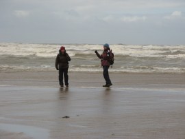 Val and Sara wetting their boots